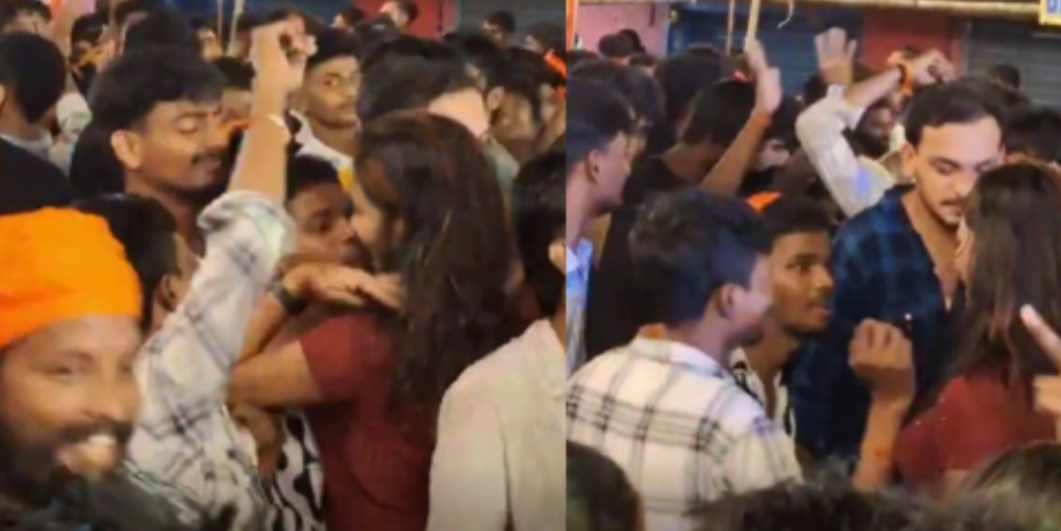 young man dances obscenely with a young woman wearing a saffron shawl